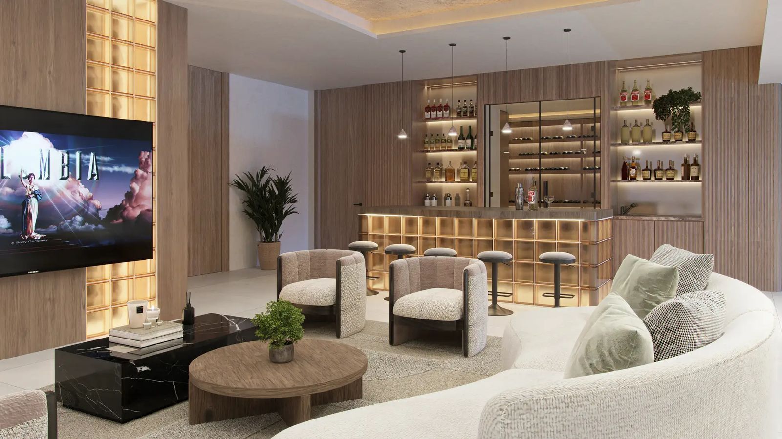 Modern living room with a fully stocked bar, comfortable seating, and a large television displaying a movie.