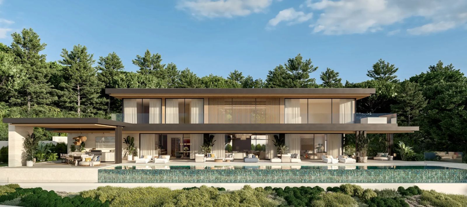 Modern villa with infinity pool, outdoor seating area, and an outdoor kitchen, surrounded by lush greenery.